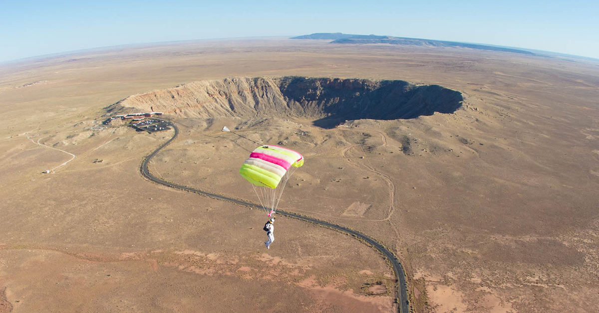 Skydivers Jump Over Meteor Crater