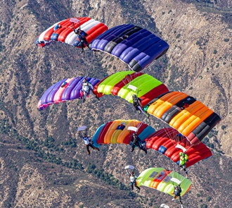 Canopy Formation Skydivers Fall from Planes